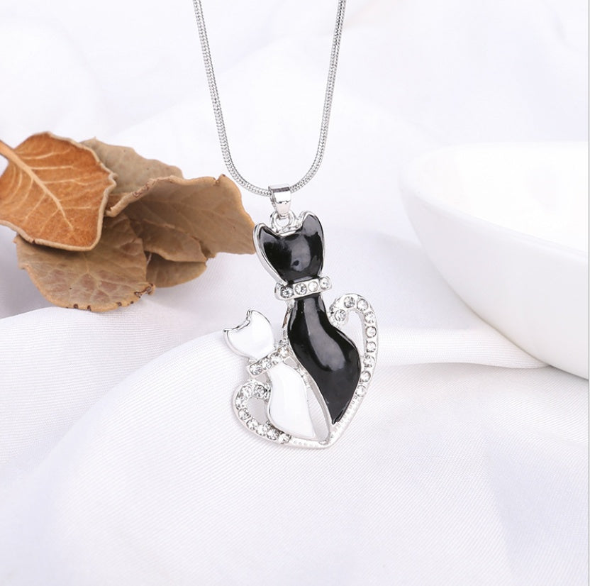 Cats in Love Heart Necklace – Black & White Crystal Pendant